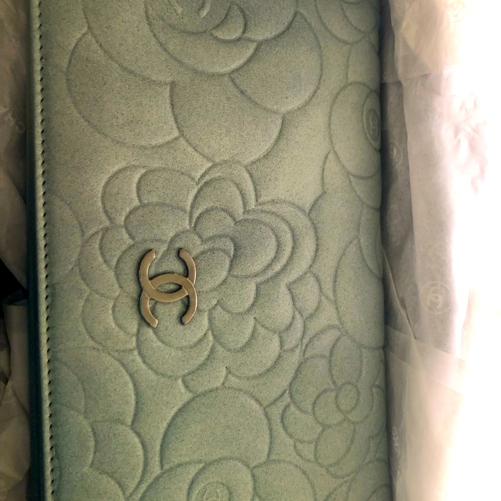 Chanel powder blue leather camellia bifold wallet. Hold credit cards and change